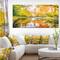 Designart - Bright Fall Forest with River - Large landscape Canvas Art Print